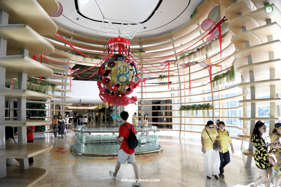 People walk passing through Louis Vuitton Shop at Gaysorn Plaza